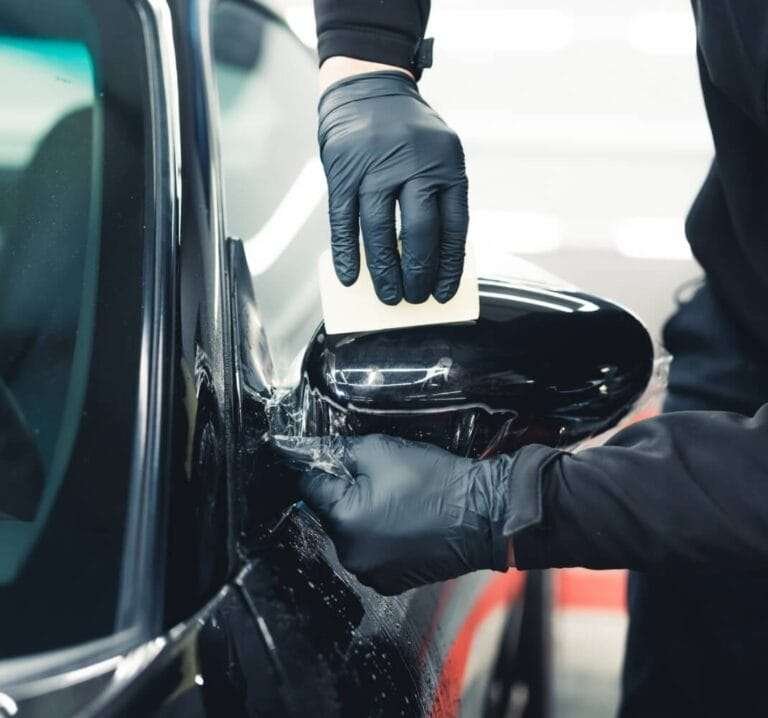 PPF installation on a black car